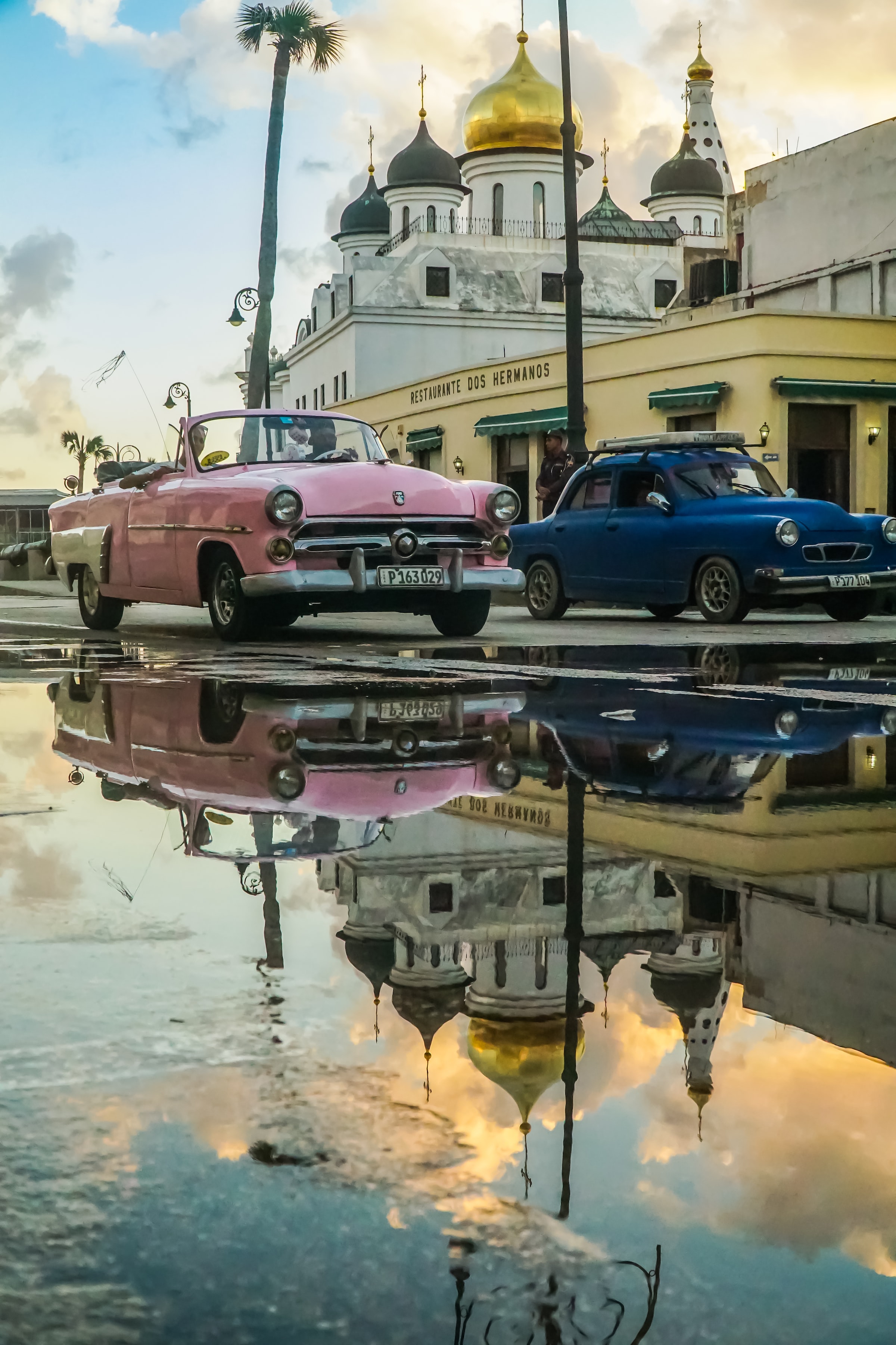 Cuba car and landmark reflect
